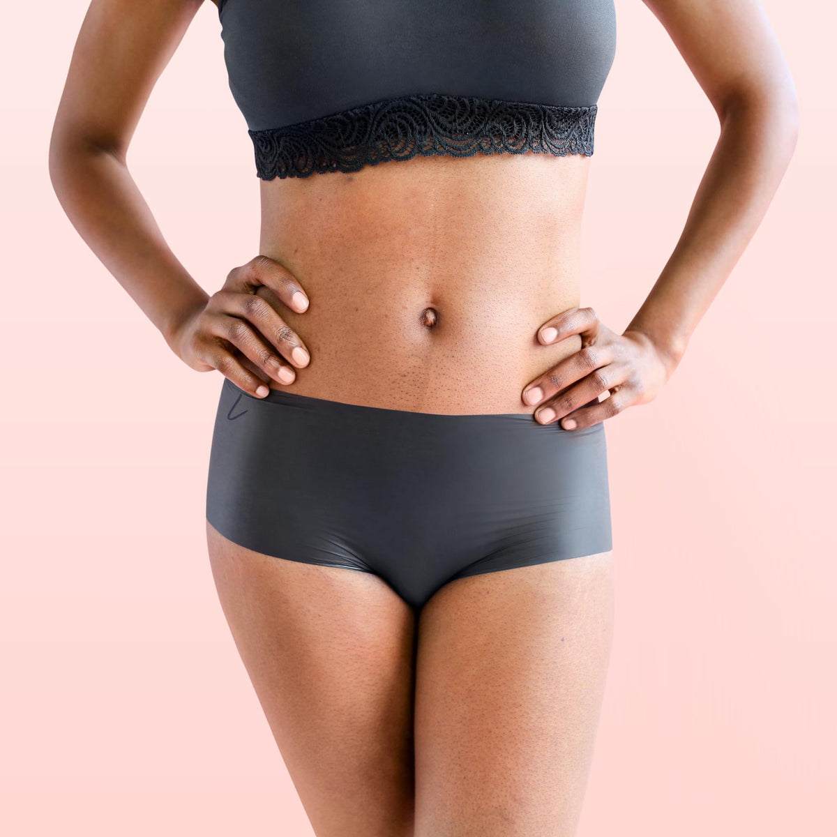 Lorals model Gladys demonstrates the front view of Pleasure Undies in Black Shorties